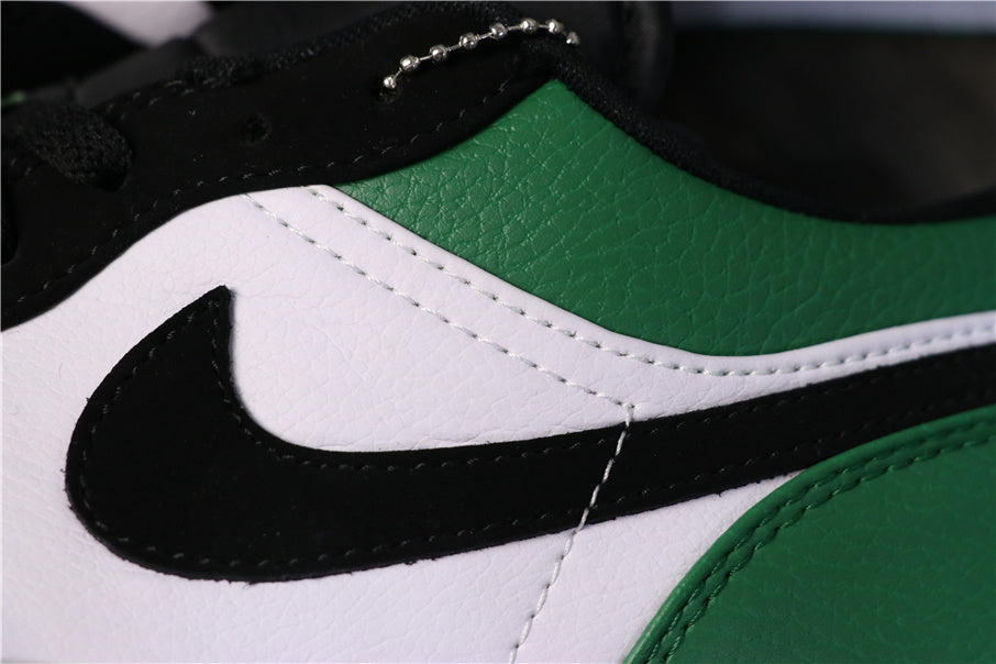 Jordan 1 Low Sneakers in Black Green 553558-113 - product image from the listing.