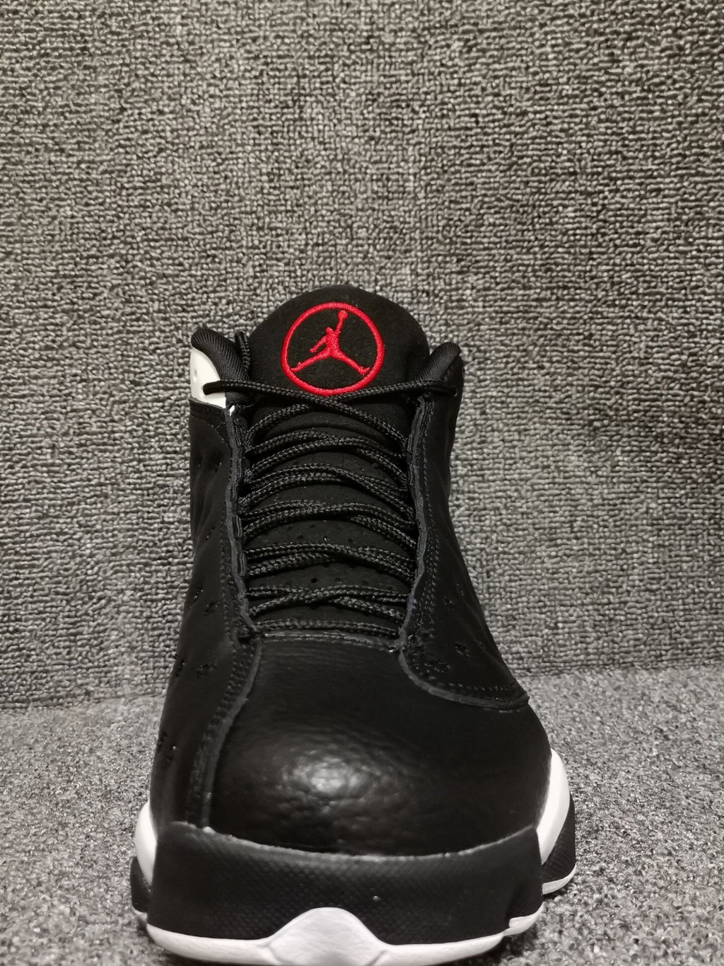 Air Jordan 13 Retro Black Red White Sneakers - product image from the listing.