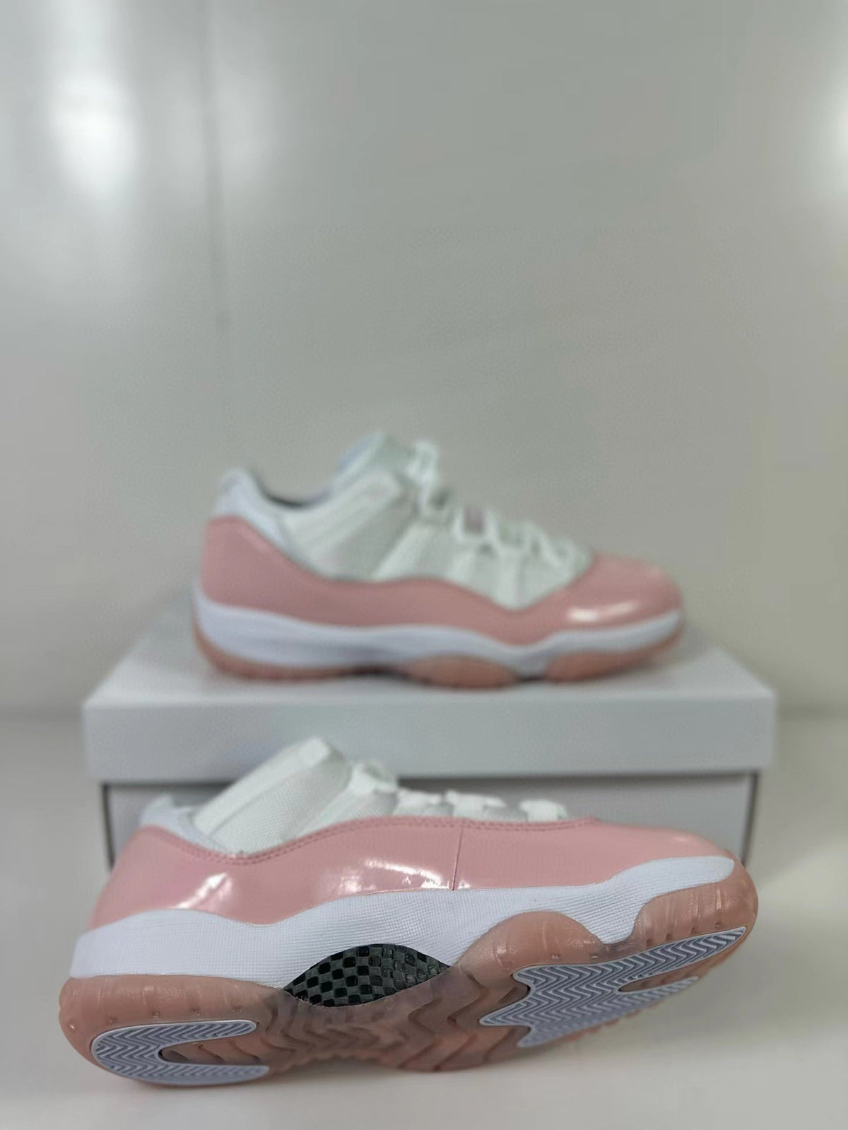 Air Jordan 11 Low Women's Pink Sneakers AH7860-160 - product image from the listing.