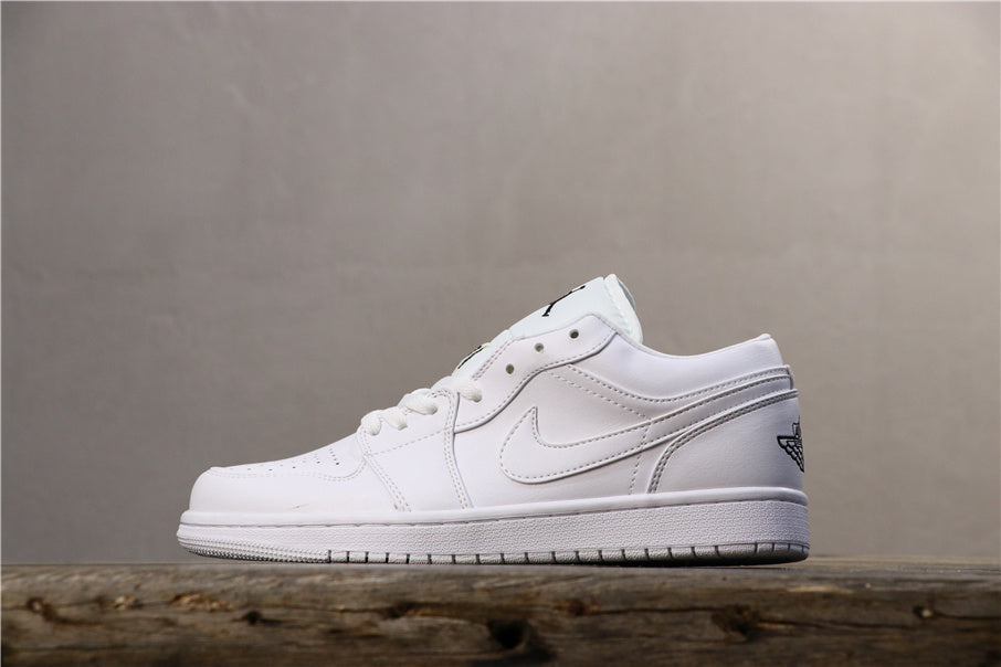 Nike Air Jordan 1 Low Sneakers in White 553560-101 - product image from the listing.
