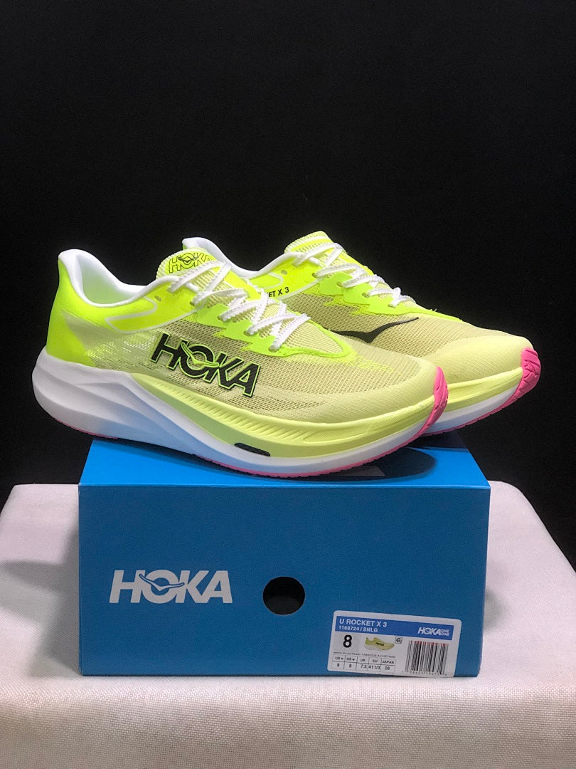 HOKA Rocket X 3 Running Shoes in Neon in Yellow and Pink - product image from the listing.