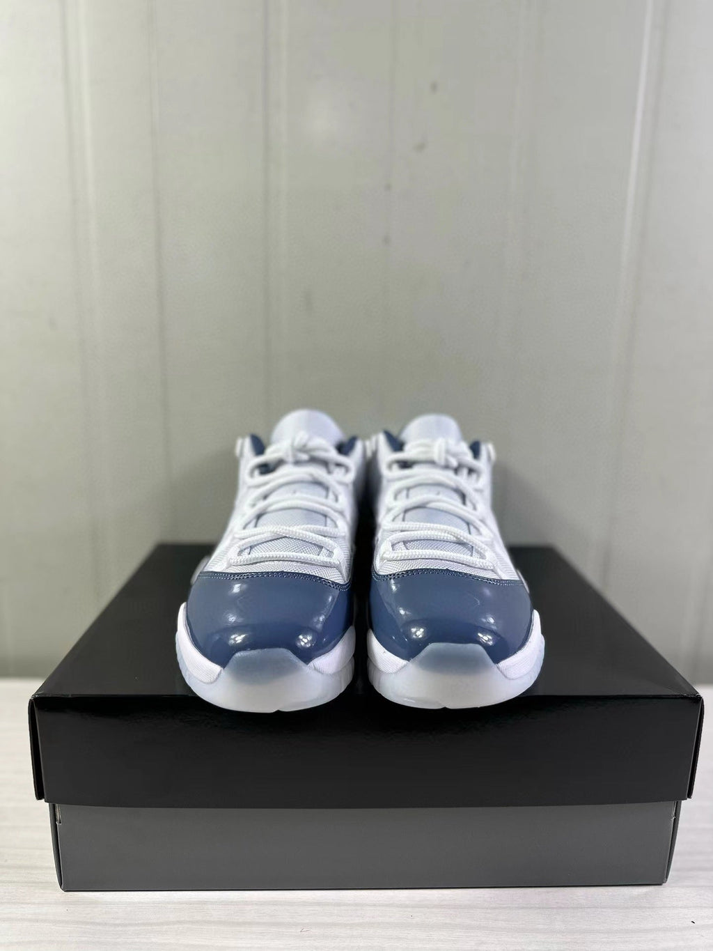 Air Jordan 11 Low Diffused Blue Sneakers FV5104-104 - product image from the listing.