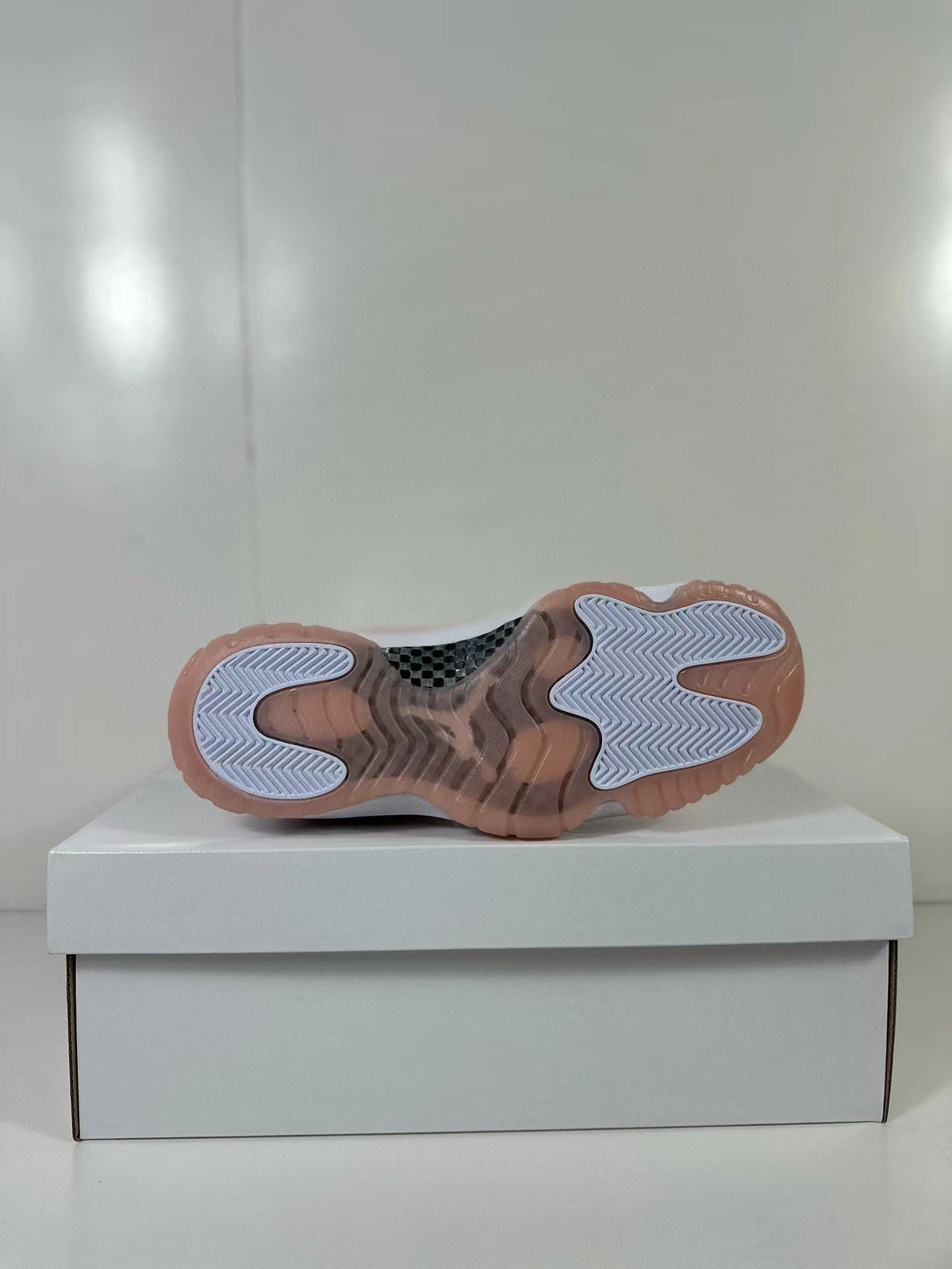 Air Jordan 11 Low Women's Pink Sneakers AH7860-160 - product image from the listing.