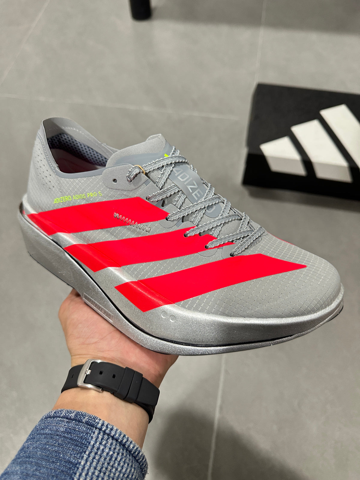 adidas Adizero Adios Pro 5 Running Shoes in Grey Red - product image from the listing.