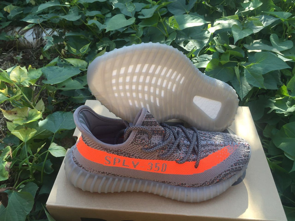 Yeezy 350 V2 Sneakers in Gray and Orange Knit - product image from the listing.