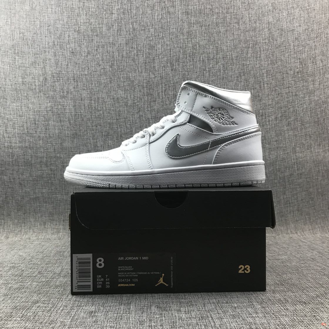 Air Jordan 1 Mid Sneakers in White Silver 554724-105 - product image from the listing.