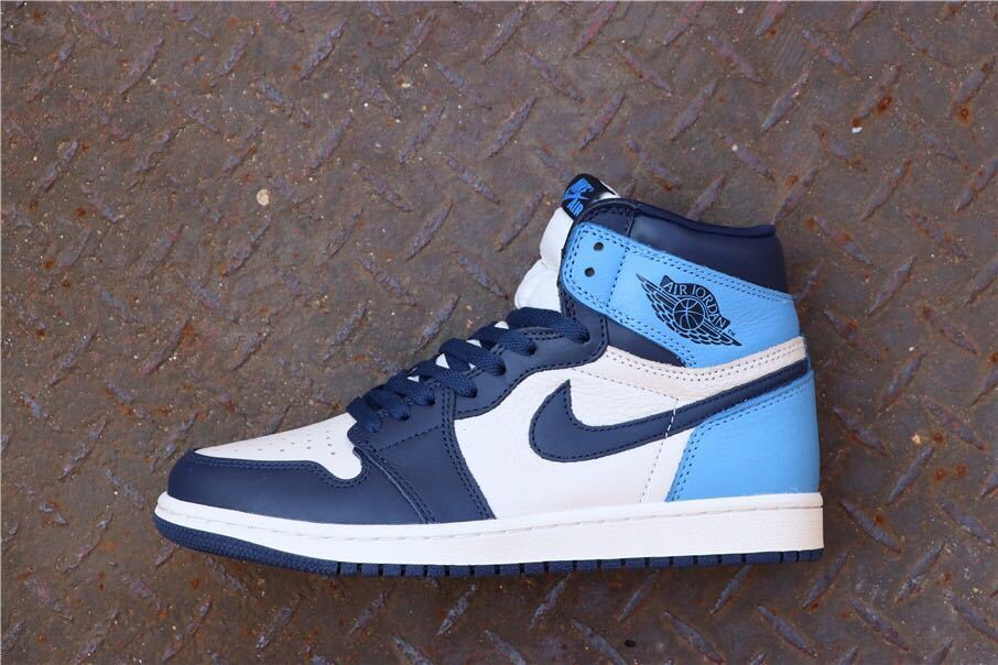 Air Jordan 1 Retro High OG Sneakers in Blue and White - product image from the listing.