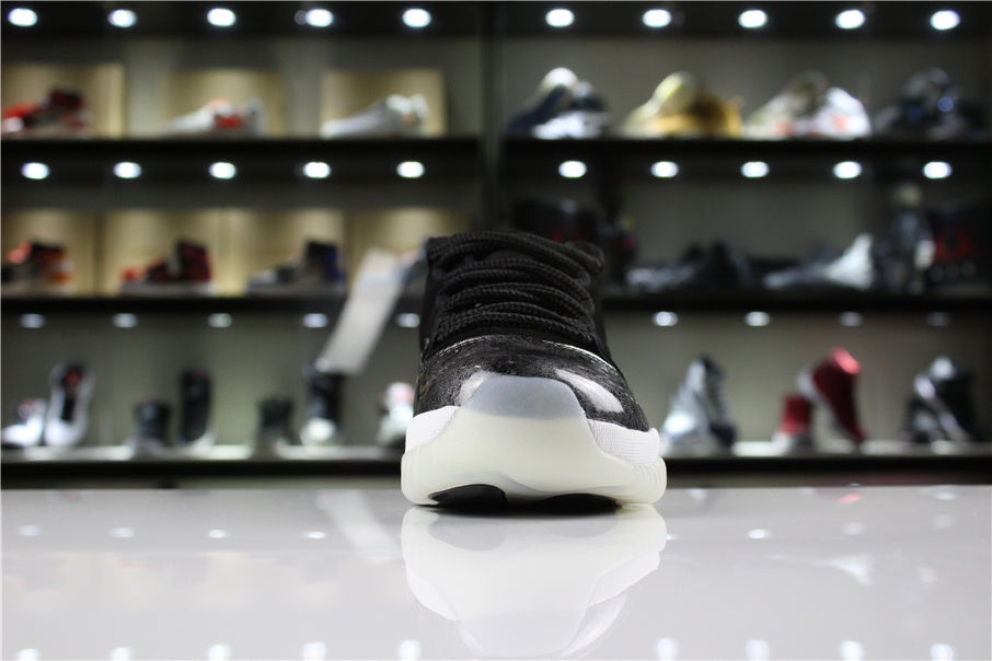 Jordan 11 Retro Low Barons Sneakers in Black White - product image from the listing.
