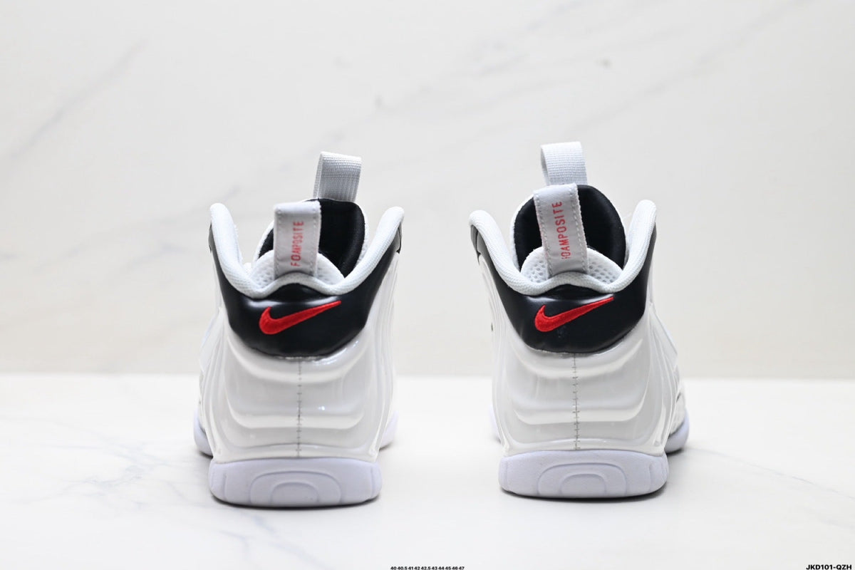 Nike Air More Uptempo Basketball Sneakers in White and Black - product image from the listing.