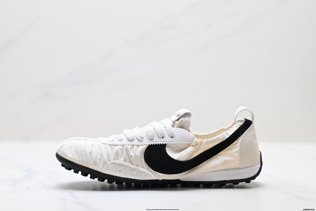 Jacquemus x Nike Jacumoon Low-Top Sneakers, in White and Black - product image from the listing.