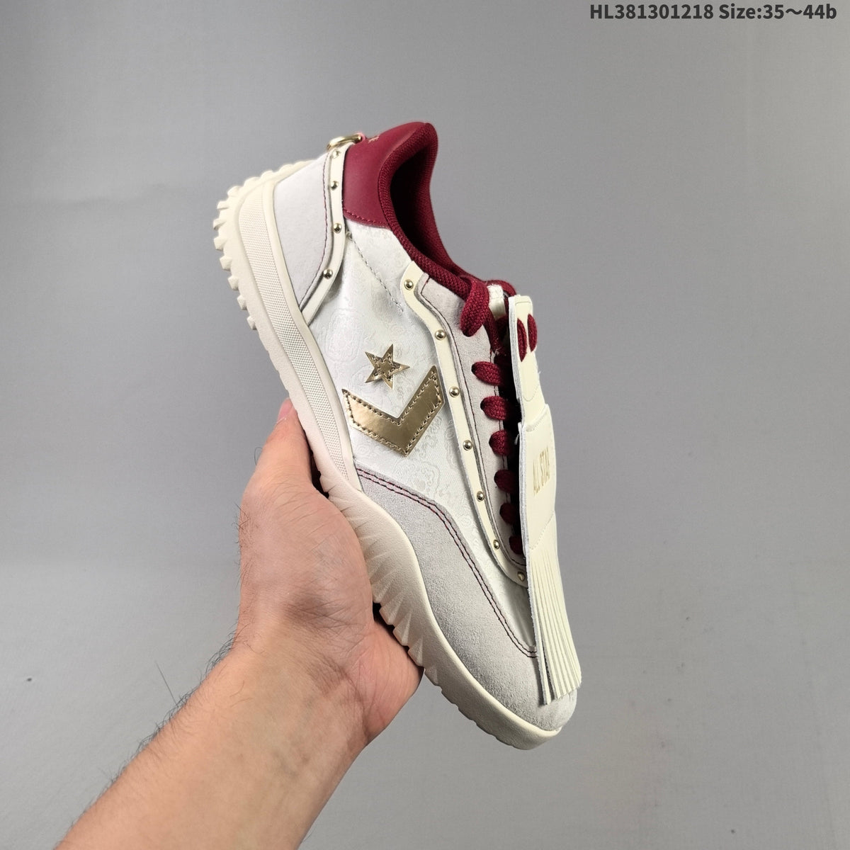 Converse 1970 Low-Top Sneakers in White Burgundy Gold - product image from the listing.