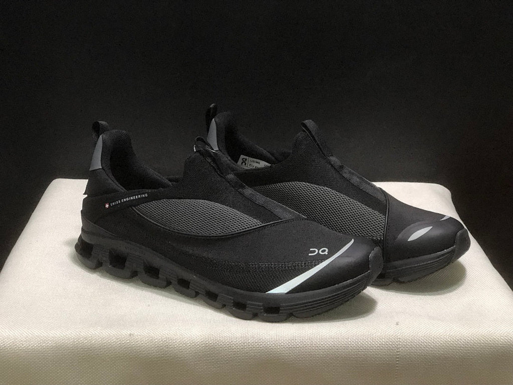 On Cloud 4 Coast Black Slip-On Trainers - product image from the listing.