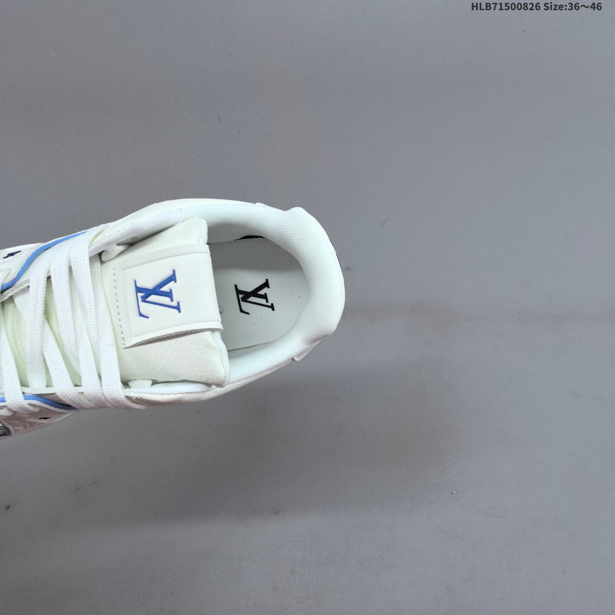Louis Vuitton White Low-Cut Sneakers with Blue Accents - product image from the listing.