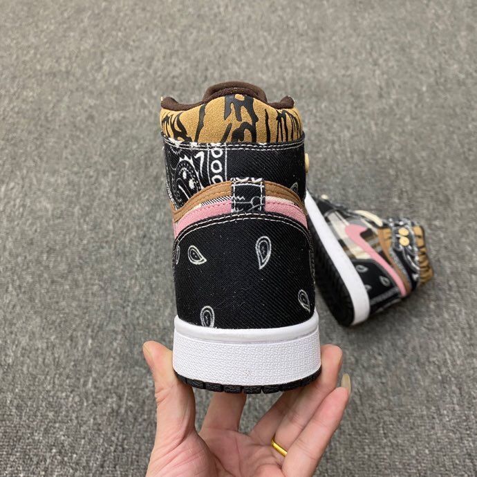 Jordan 1 Mid Paisley Sneakers in Black Tan Pink White - product image from the listing.