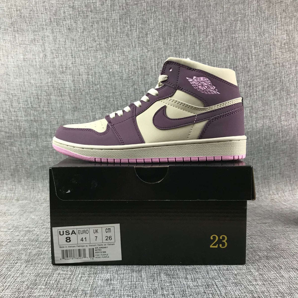 Air Jordan 1 Mid Sneakers in Pink Purple 555112-500 - product image from the listing.