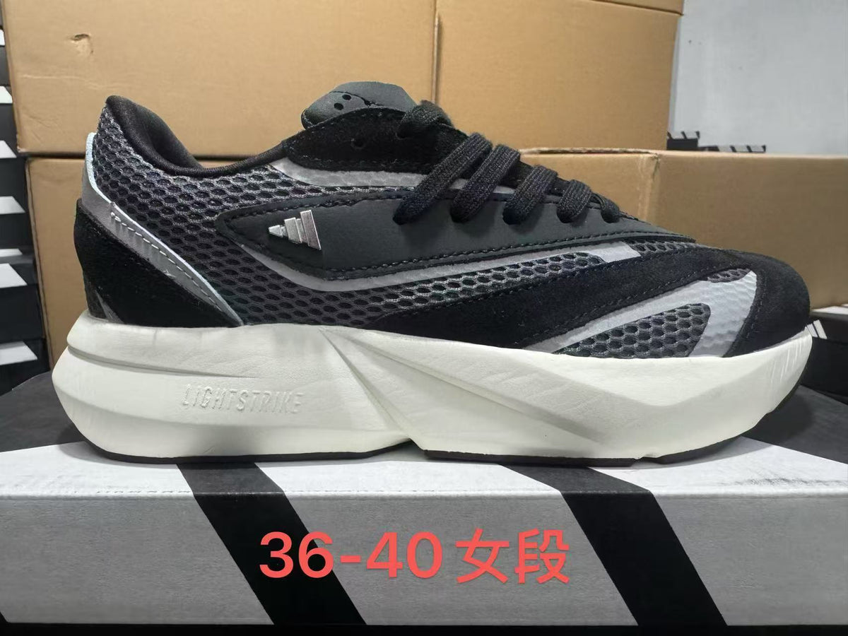 Adidas JH6959 Sneakers in Black and Grey - product image from the listing.