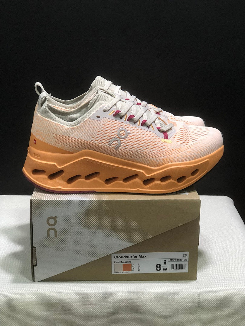 On Cloudsurfer Max Shoes for Running in Pearl and Tangerine - product image from the listing.