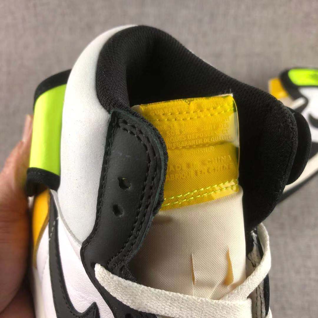 Air Jordan 1 High OG Volt Gold Sneakers Black White - product image from the listing.
