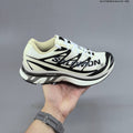 MM6 Maison Margiela x Salomon XT-4 Sneakers, in White and Black - product image from the listing.