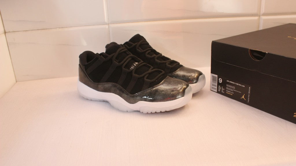 Air Jordan 11 Low Barons Black Sneakers - product image from the listing.