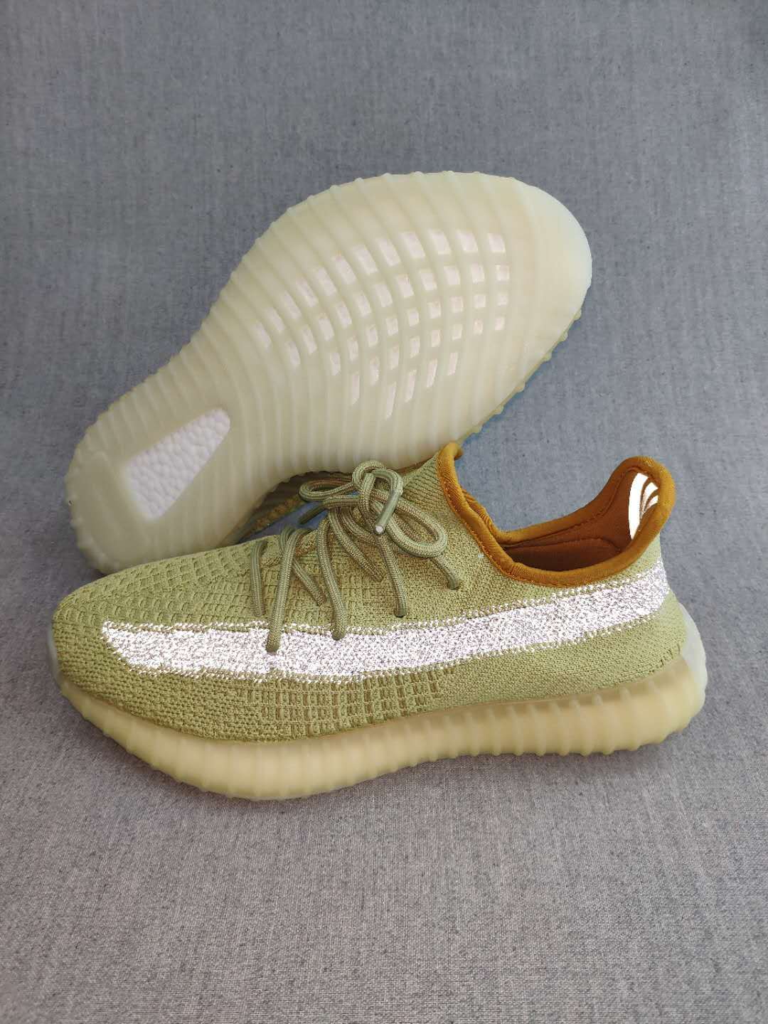 Yeezy 350 V2 Static Reflective Sneakers in Green - product image from the listing.