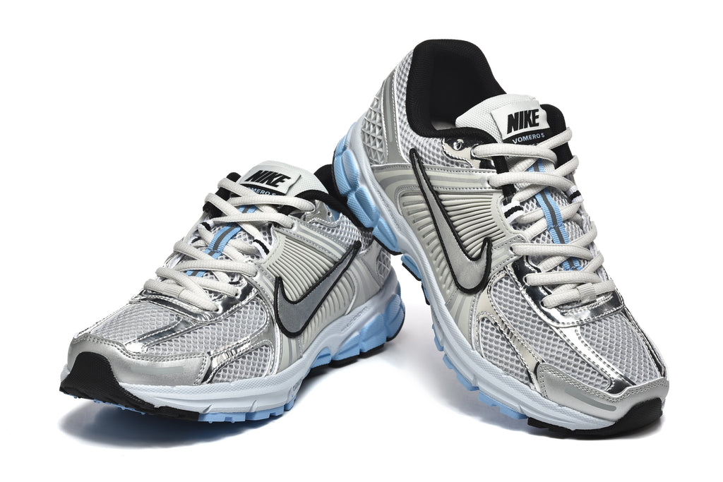 Nike Vomero 5 Sneakers in Silver and Light Blue - product image from the listing.