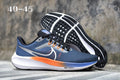 Nike Air Zoom Pegasus 38 Running Shoes, in Blue and Orange - product image from the listing.