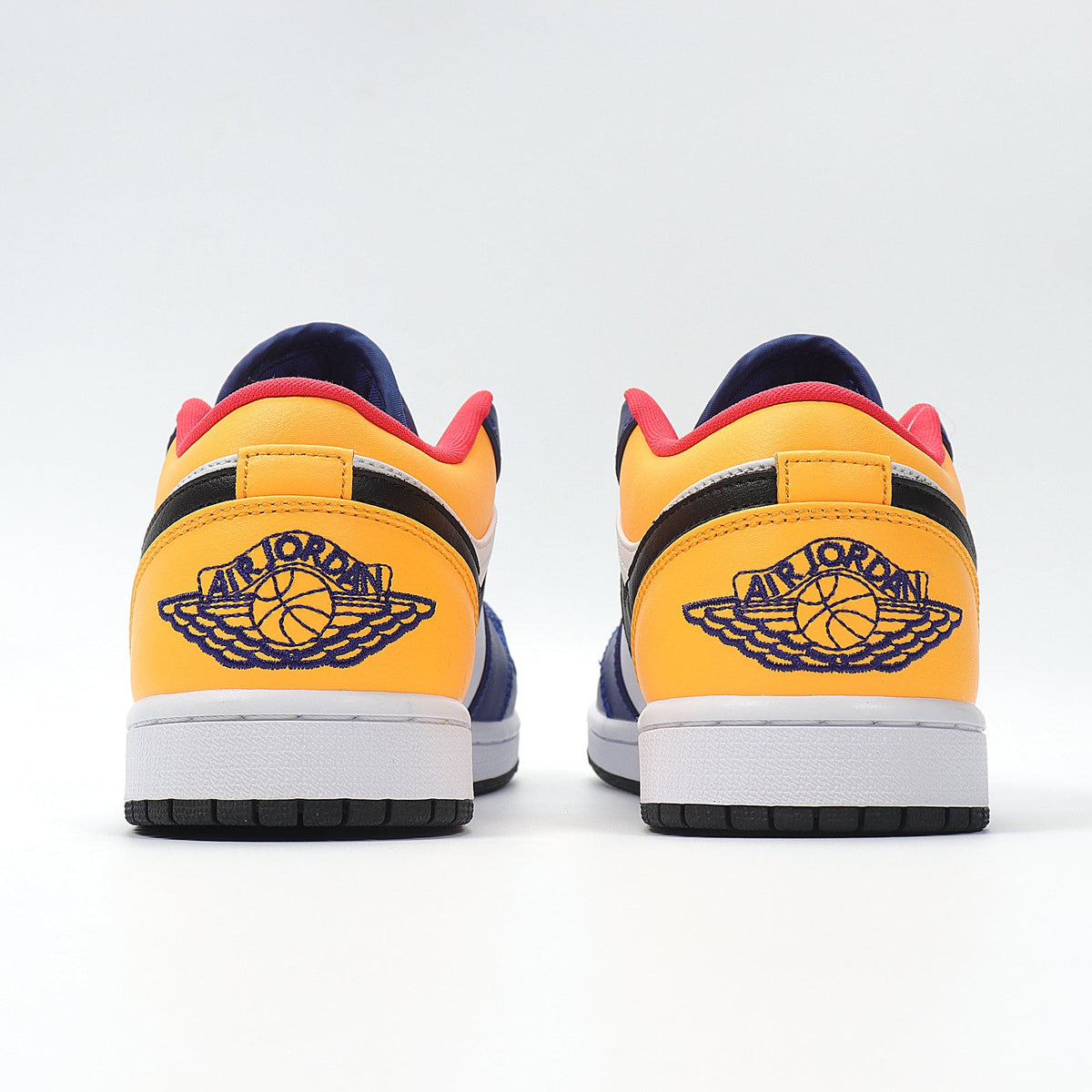 Jordan 1 Low Sneakers in Blue, in White and Yellow 553558-123 - product image from the listing.