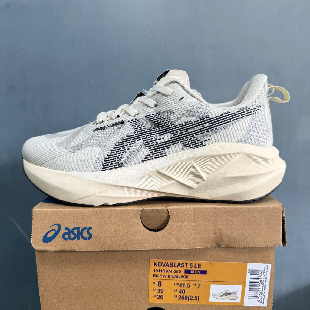 ASICS NOVABLAST 5 LE Running Shoes, in White and Black - product image from the listing.