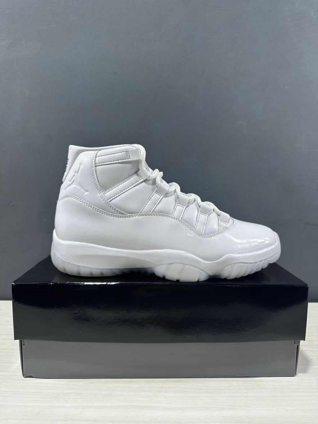 Air Jordan 11 Retro All-White High-Top Sneakers - product image from the listing.