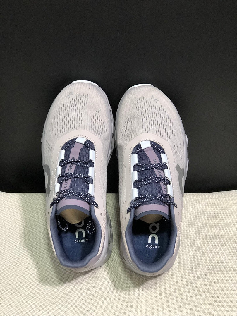 Gray and Purple On Cloudmonster Sneakers - product image from the listing.