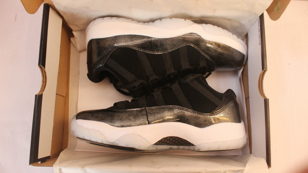 Air Jordan 11 Low Barons Black Sneakers - product image from the listing.