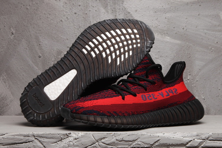 Red and Black Yeezy 350 V2 Knit Sneakers - product image from the listing.