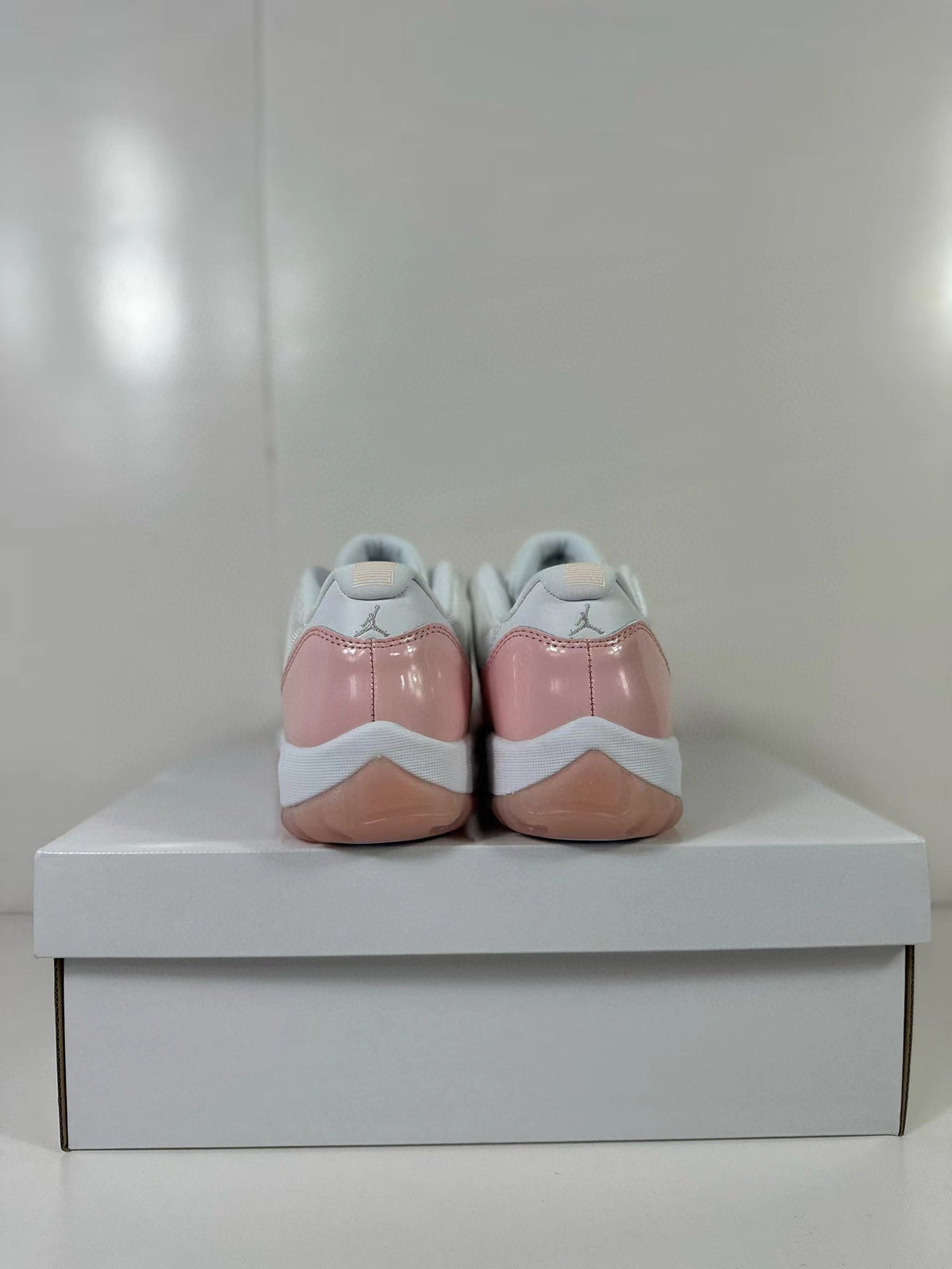 Air Jordan 11 Low Women's Pink Sneakers AH7860-160 - product image from the listing.