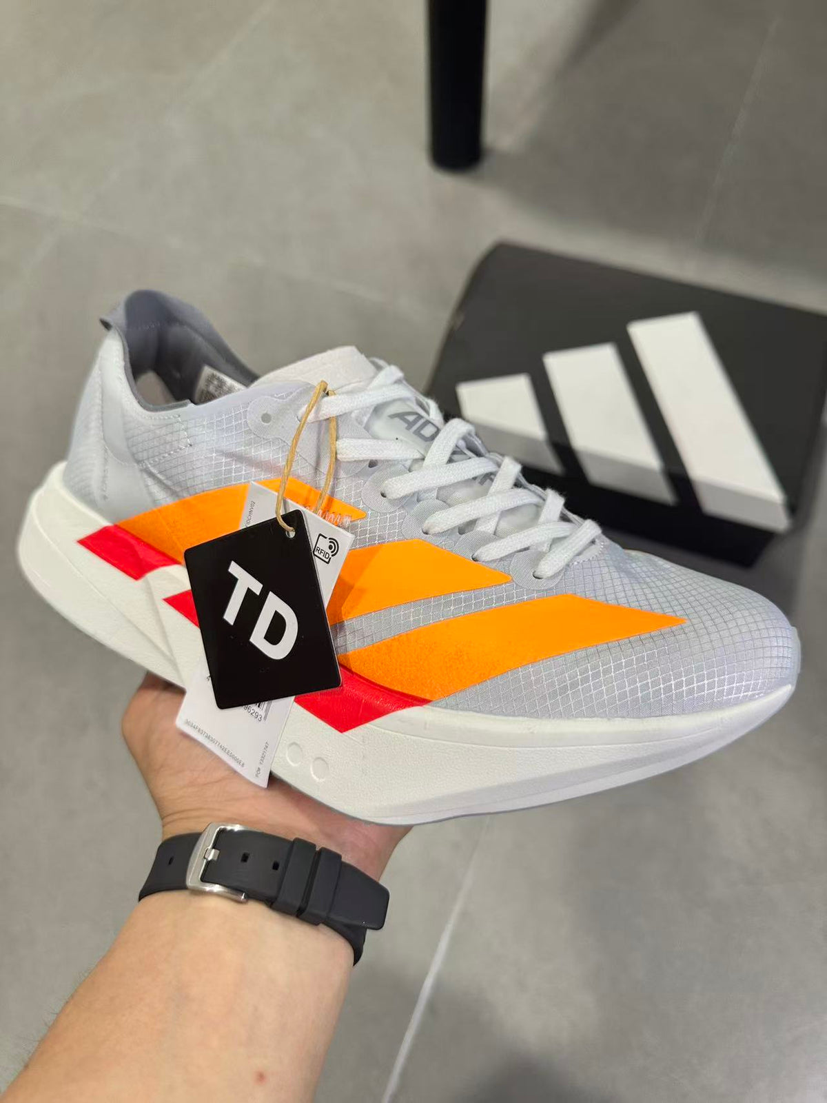 Adidas Adizero Lightstrike Pro Running Shoes in White Orange - product image from the listing.