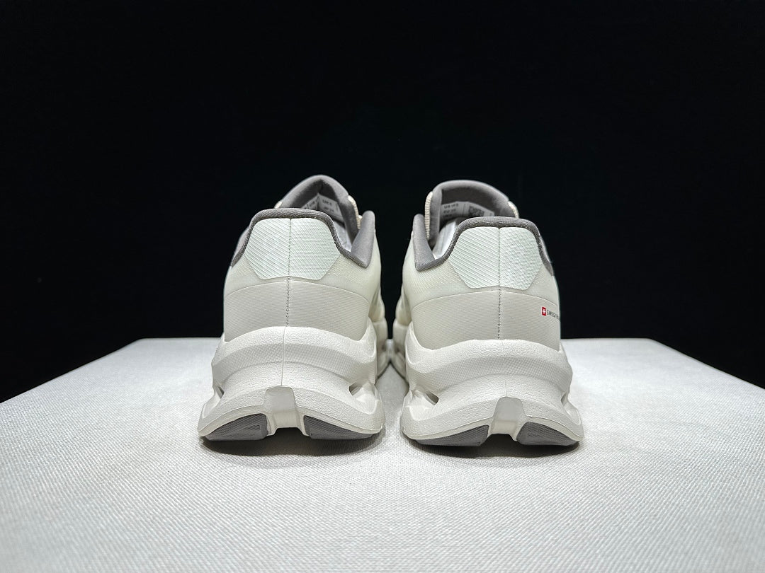 Ivory and Gray On Cloudtilt Remix Sneakers - product image from the listing.