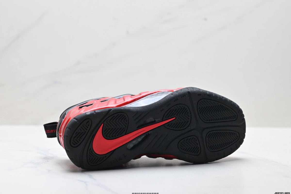 Nike Air Foamposite One Penny Sneakers in Red and Black - product image from the listing.