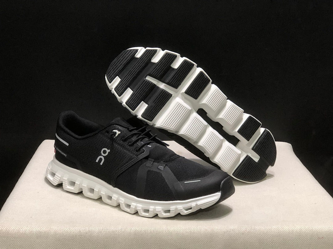 On Cloud 6 Running Sneakers in Black White - product image from the listing.
