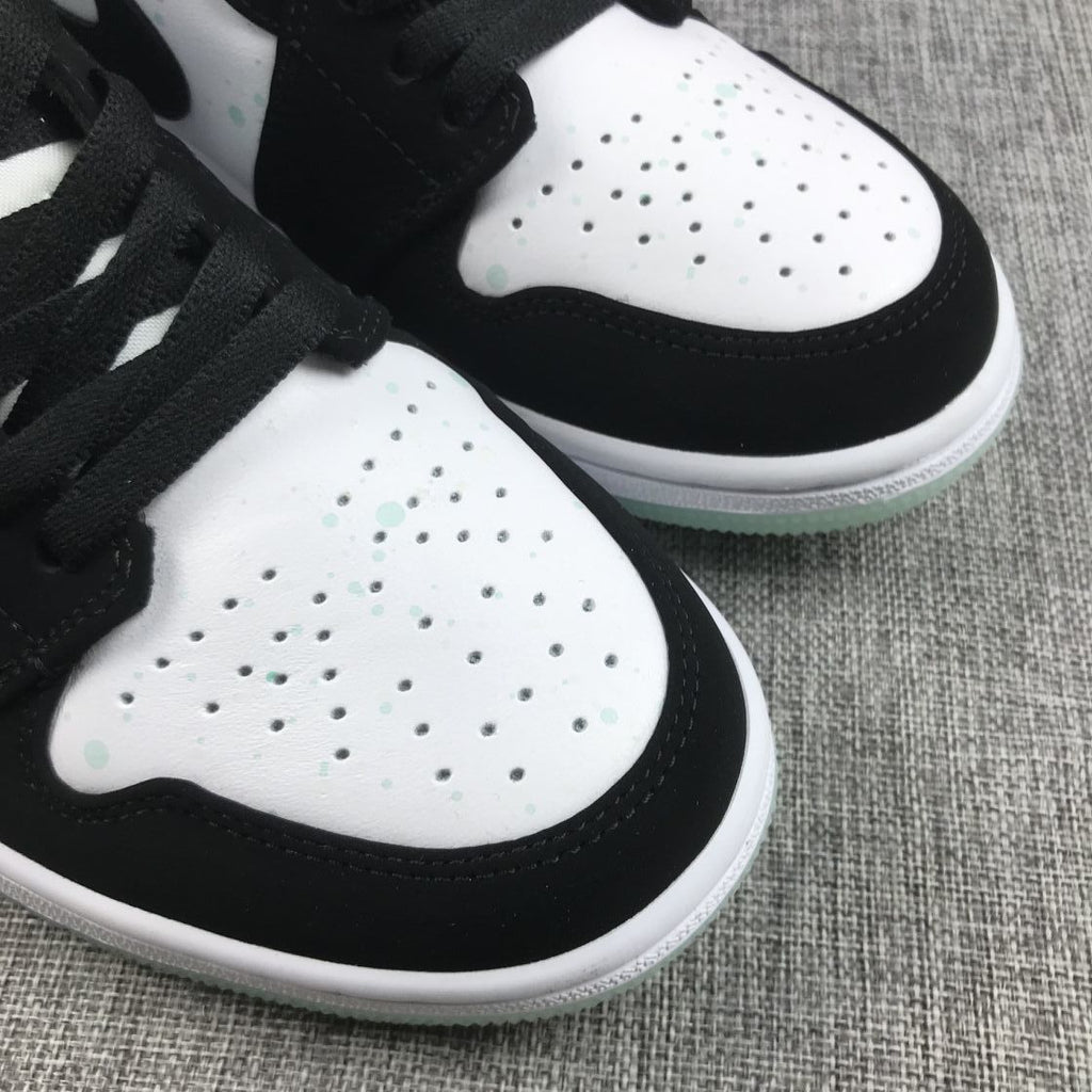 Air Jordan 1 Mid Sneakers in Black White Mint BQ6931-103 - product image from the listing.