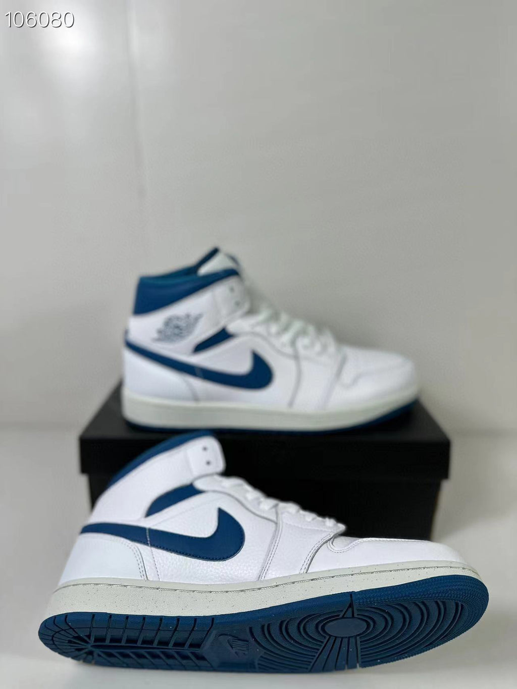 Air Jordan 1 Mid White Blue FN5215-141 Sneakers - product image from the listing.