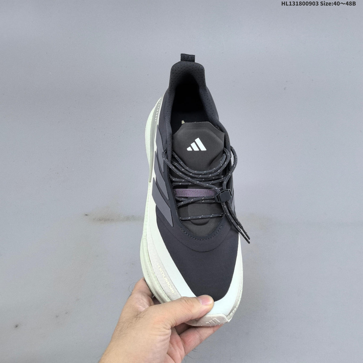 Adidas Ultraboost 5 Running Shoes, in Charcoal and Cream - product image from the listing.