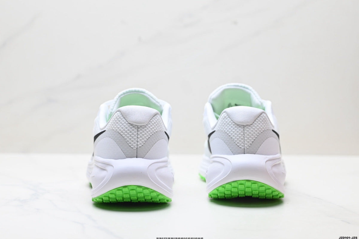 Nike Revolution 8 Running Shoes in White and Green - product image from the listing.