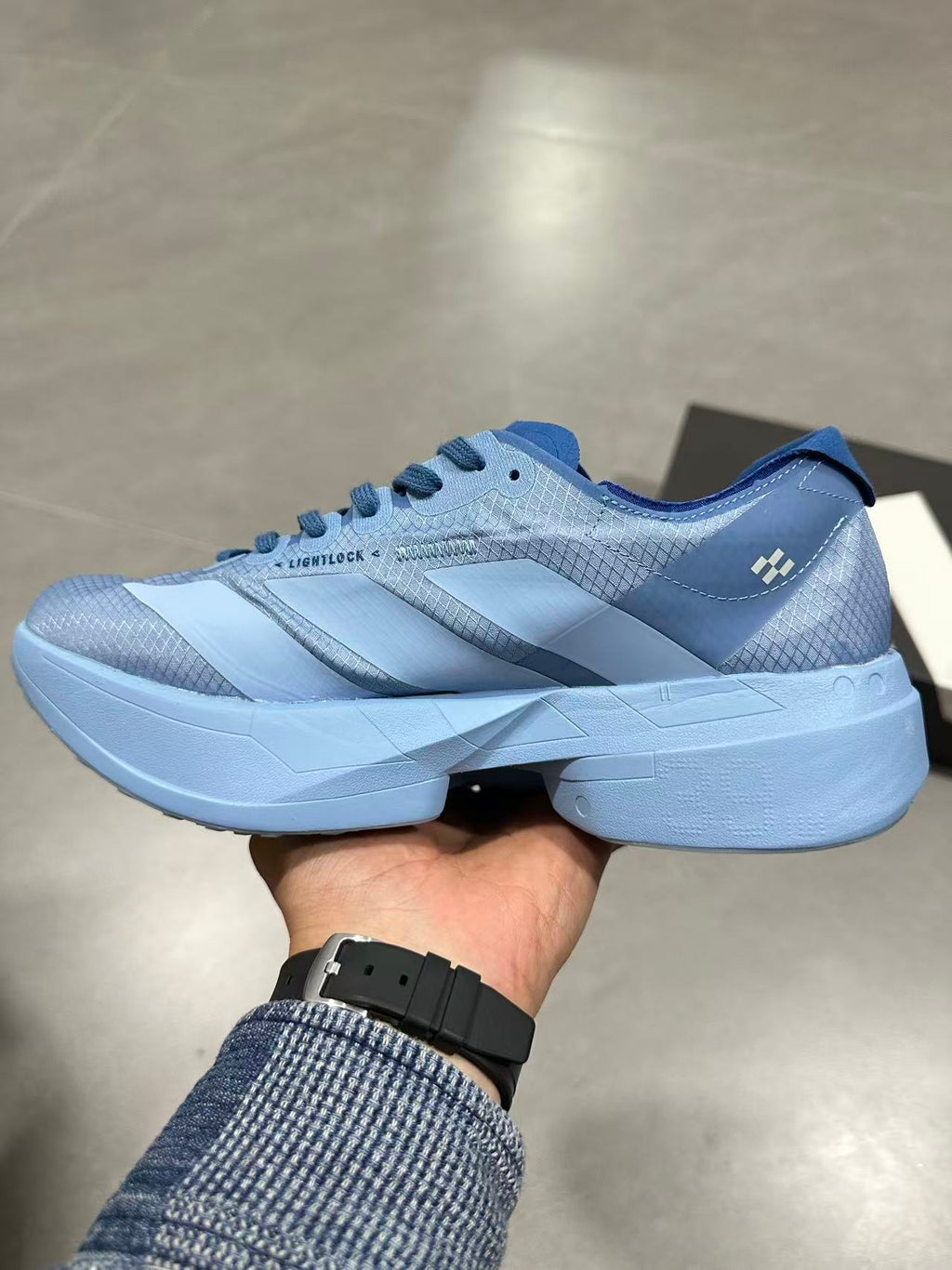 Blue Adidas Lightstrike Pro Running Shoes - product image from the listing.