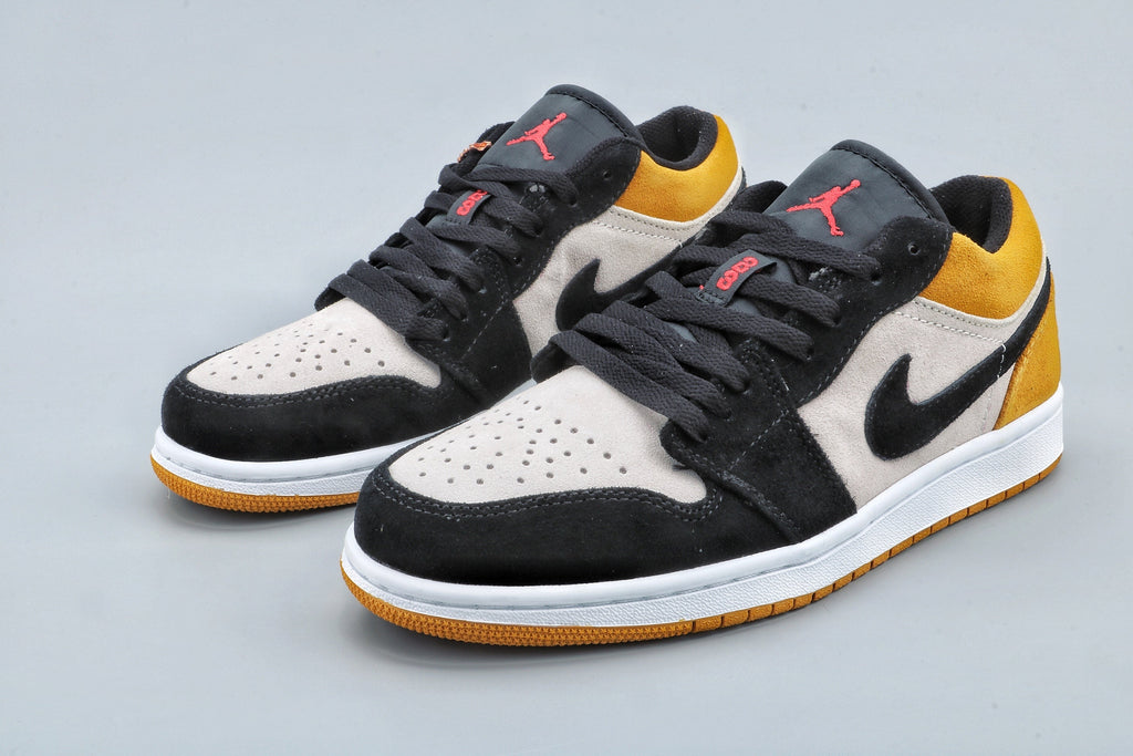 Yellow Toe Sneakers - Jordan 1 Low - product image from the listing.