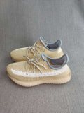 Beige Yeezy Boost 350 V2 Reflective Knit Sneakers - product image from the listing.