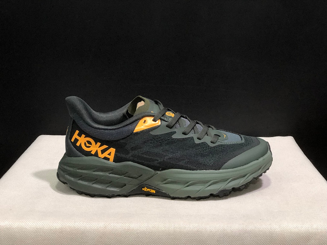 HOKA Speedgoat 5 Trail Running Shoes, in Black and Olive - product image from the listing.
