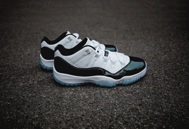 White and Black Air Jordan 11 Iridescent Sneakers - product image from the listing.