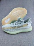 White and Tan Yeezy 350 V2 Knit Sneakers - product image from the listing.