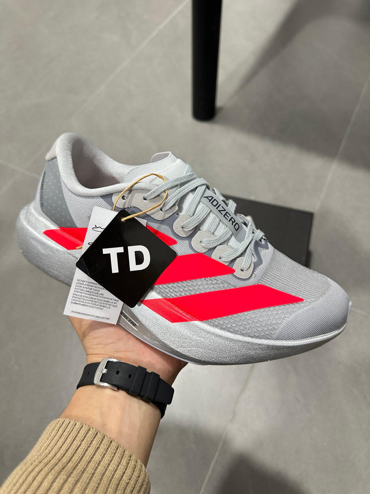 Adidas Lightstrike Pro Running Shoes, in Gray and Red KI3381 - product image from the listing.