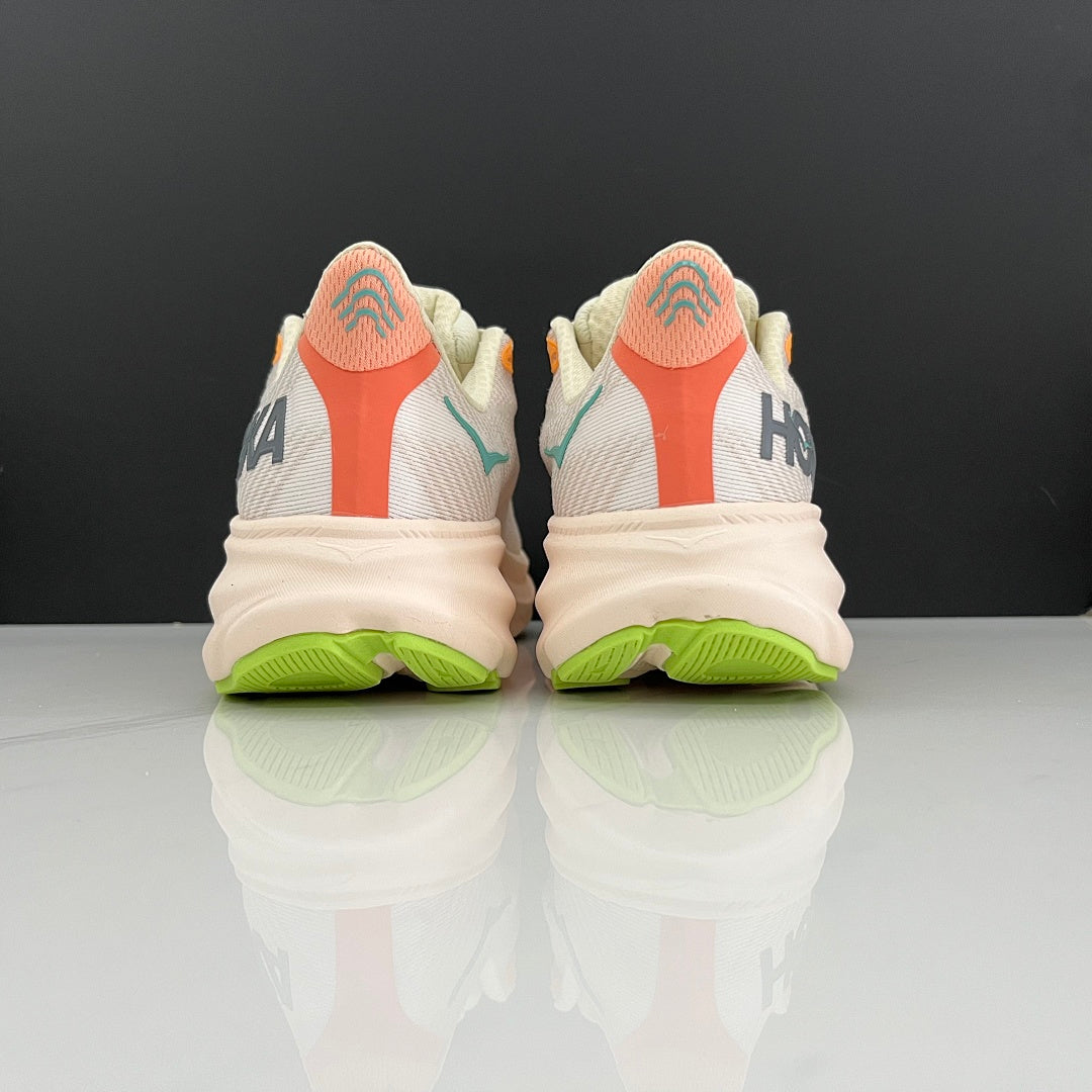 Cream and Green HOKA Clifton 9 Running Shoes - product image from the listing.